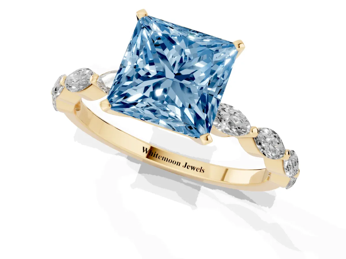 Fancy Blue Princess Cut Diamond Ring with Marquise Side Stones and Prong Setting Yellow gold