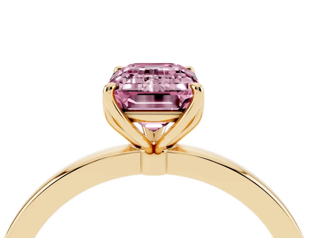 Fancy Pink Emerald Cut Diamond Solitaire Ring with Thin Band and Prong Setting Yellow gold