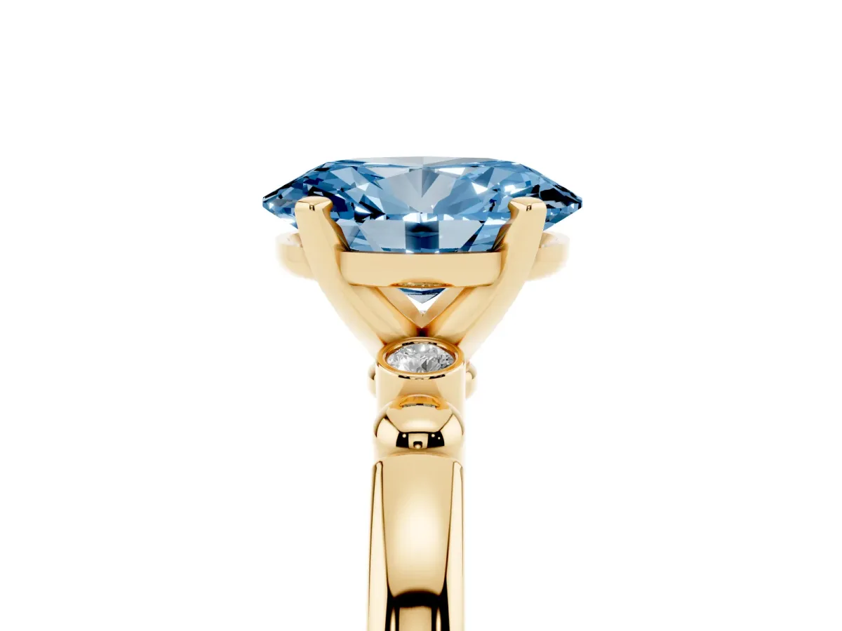 Fancy Blue Oval Cut Solitaire Beaded Band with Four-Prong Setting Yellow gold