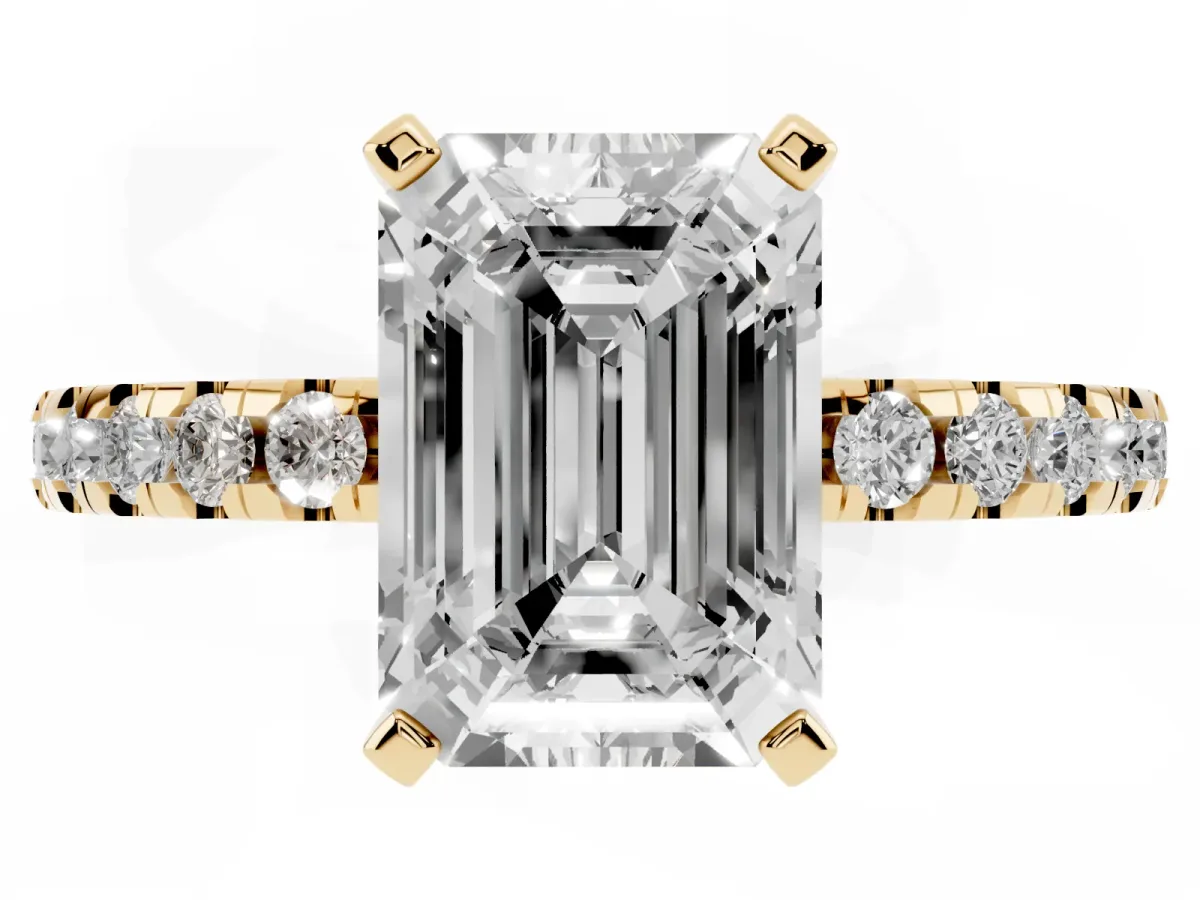 Emerald Cut Diamond Solitaire Ring with Round Pavé Band and Four-Prong Setting Yellow gold