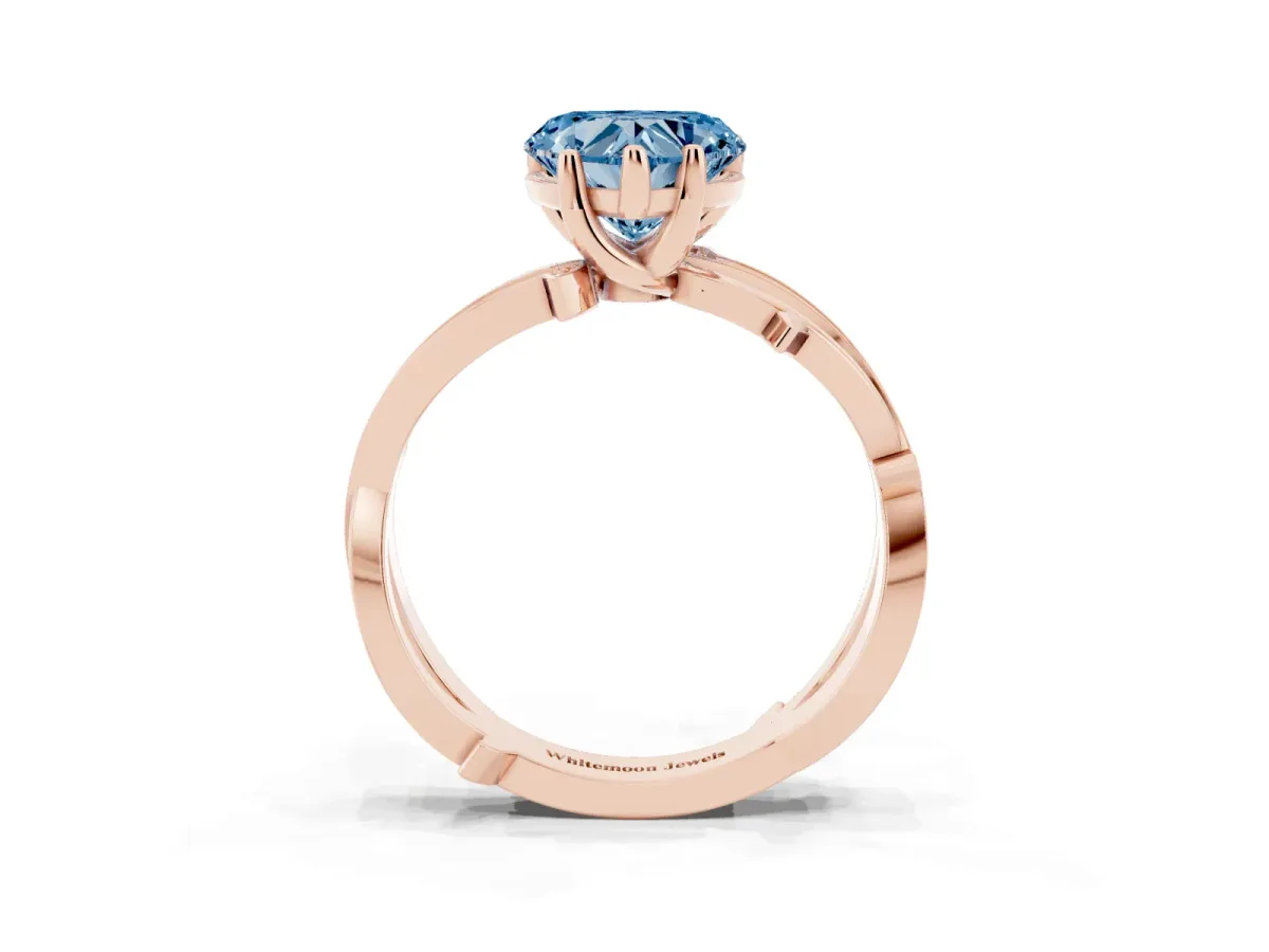 Fancy Blue Heart Cut Solitaire Twist Band with Pavé Accents and Four-Prong Setting Rose gold