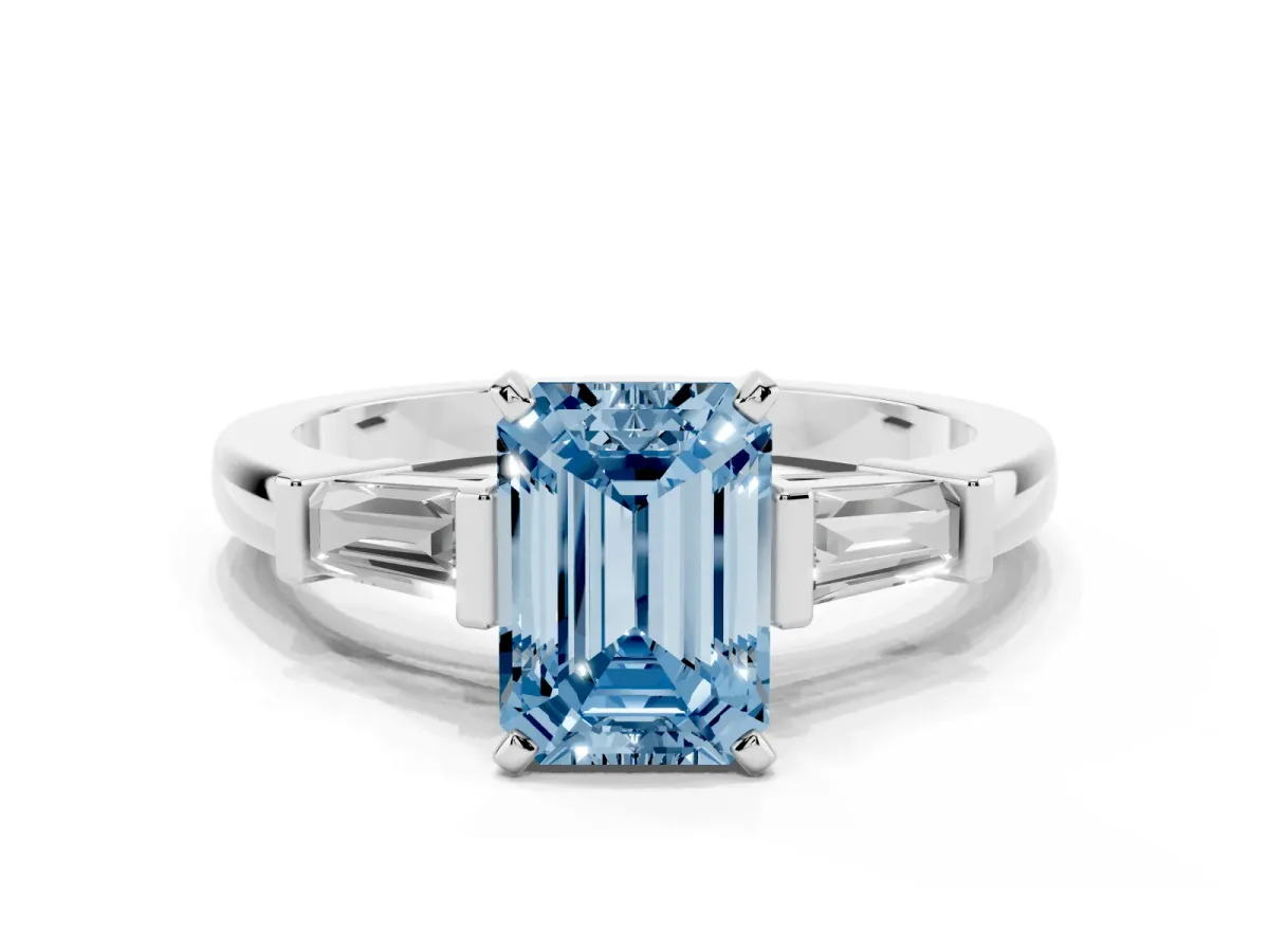 Fancy Blue Emerald Cut Cut Diamond Solitaire Ring with Tapered Baguette Accents and Four-Prong Setting Silver