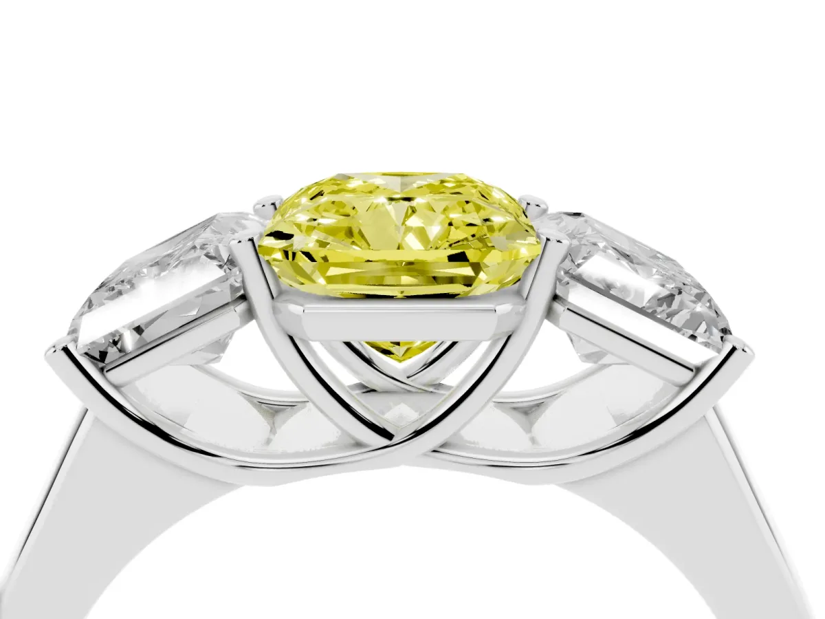 Fancy Yellow Radiant Cut Three-Stone Diamond Ring with Prong Setting on a Classic Band Silver