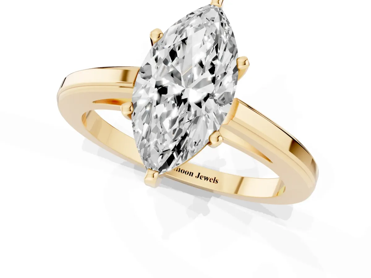 Marquise Cut Solitaire Diamond Ring with Four-Prong Setting and Classic Band Yellow gold