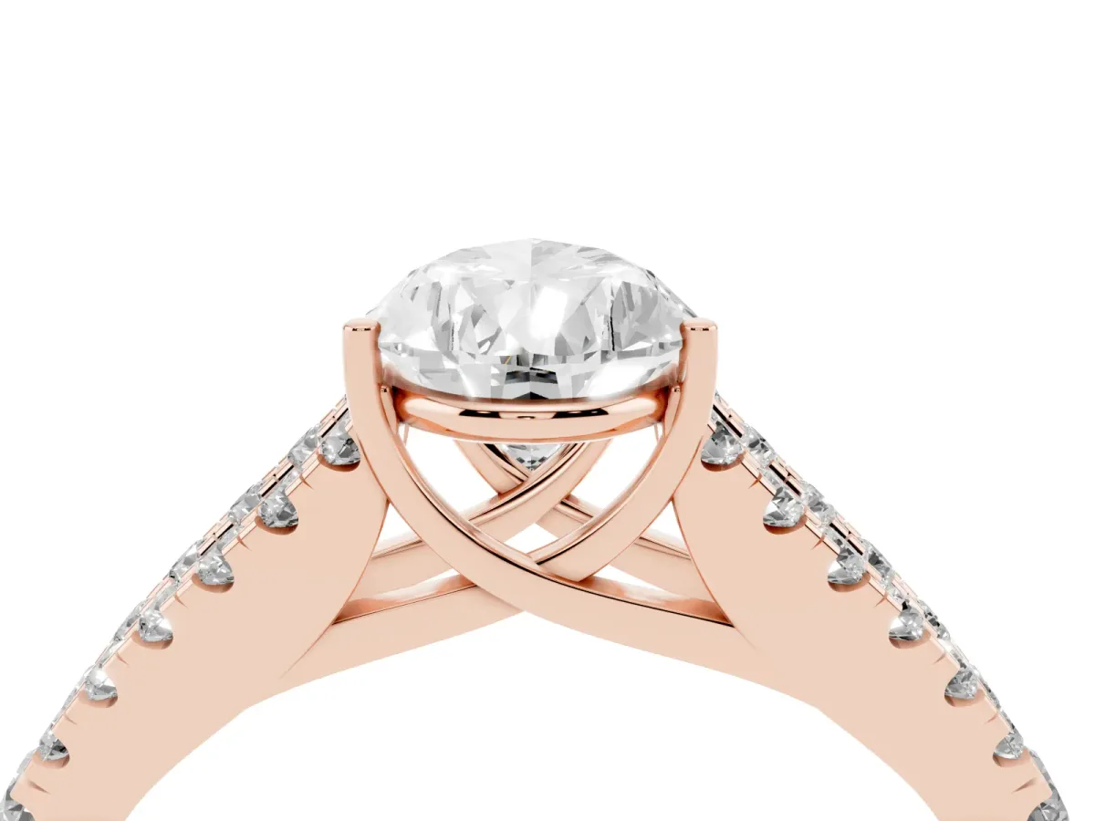 Pear Cut Diamond Split Shank Engagement Ring with Round Pavé and Prong Setting Rose gold
