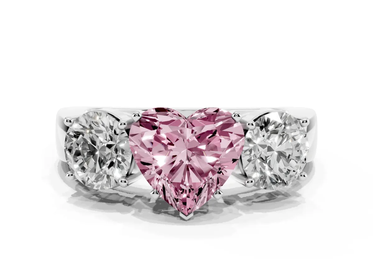 Fancy Pink Three-Stone Heart Cut Diamond Ring with Round Side Stones, Classic Band, and Four-Prong Setting Silver