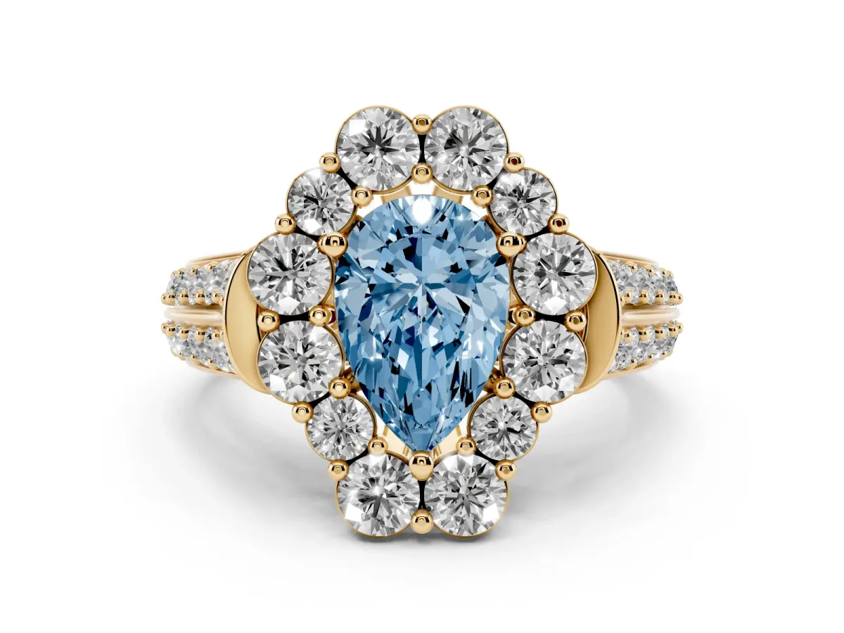 Fancy Blue Pear Cut Halo Diamond Engagement Ring with Split Shank and Prong Setting Yellow gold
