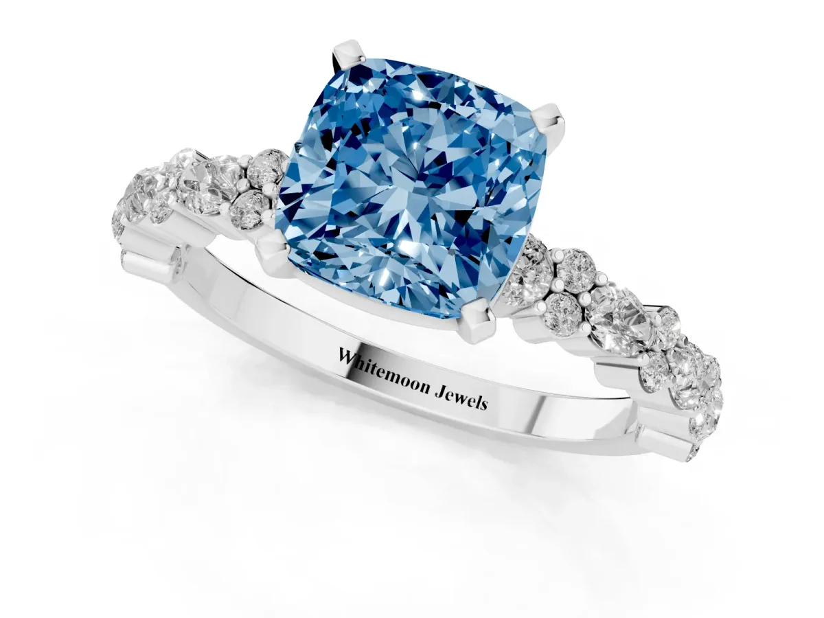 Fancy Blue Cushion Cut Diamond Side Stone Solitaire Ring with Round and Four-Prong Setting Platinum