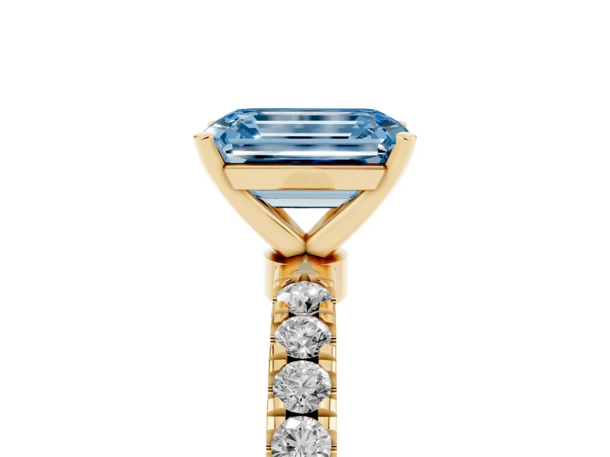 Fancy Blue Emerald Cut Diamond Solitaire Ring with Pavé Accents and Four-Prong Setting Yellow gold