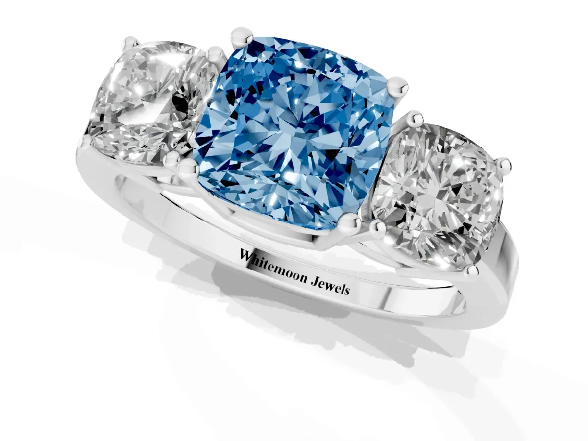 Fancy Blue Three-Stone Cushion Cut Cut Diamond Engagement Ring with Flat Band and Four-Prong Setting Silver