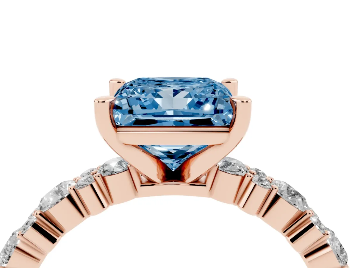 Fancy Blue Princess Cut Diamond Side Stone Solitaire Ring with Round and Four-Prong Setting Rose gold