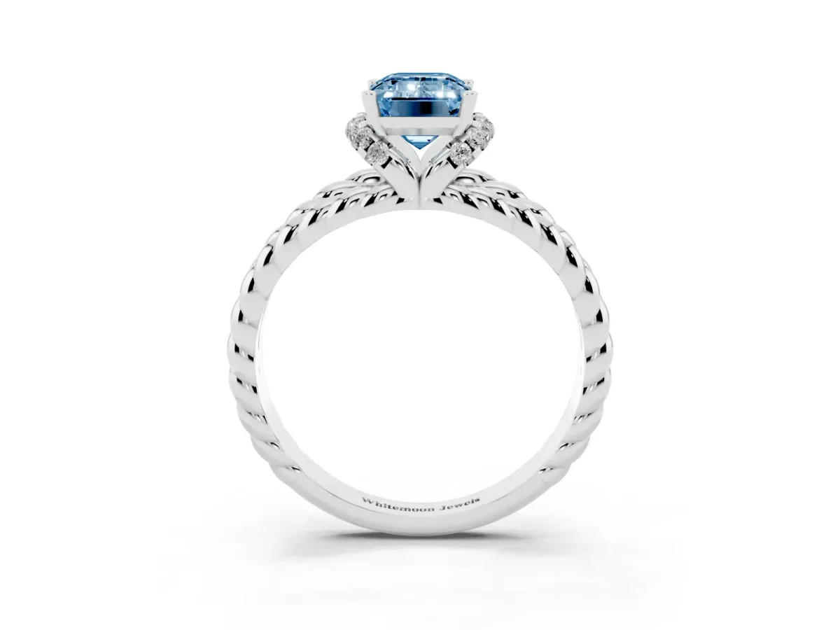 Fancy Blue Emerald Cut Halo Twisted Band Four-Prong Ring Silver