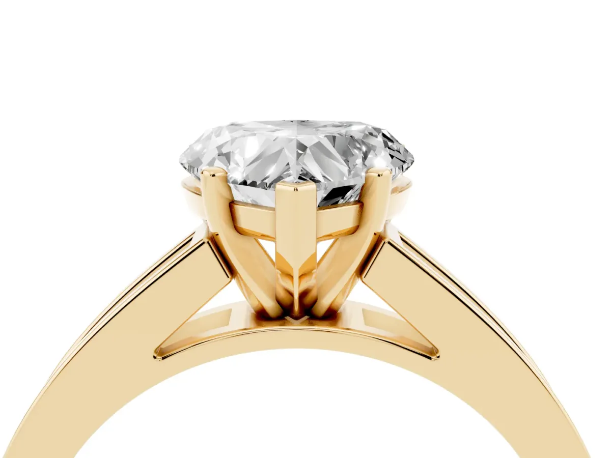 Heart Cut Solitaire Diamond Ring with Channel-Set Band and Four-Prong Setting Yellow gold