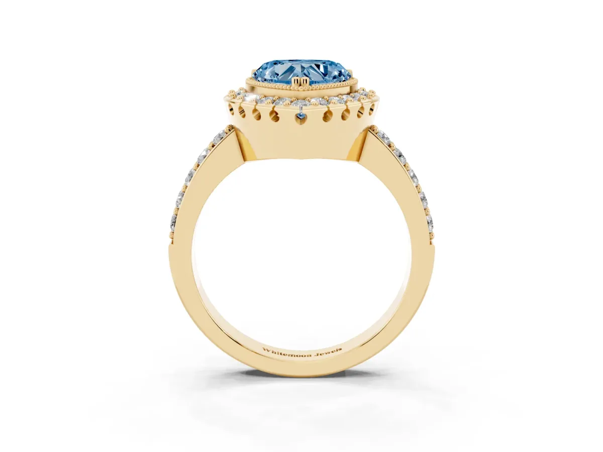 Fancy Blue Heart Cut Diamond Halo Ring with Pavé Band and Prong Setting Yellow gold