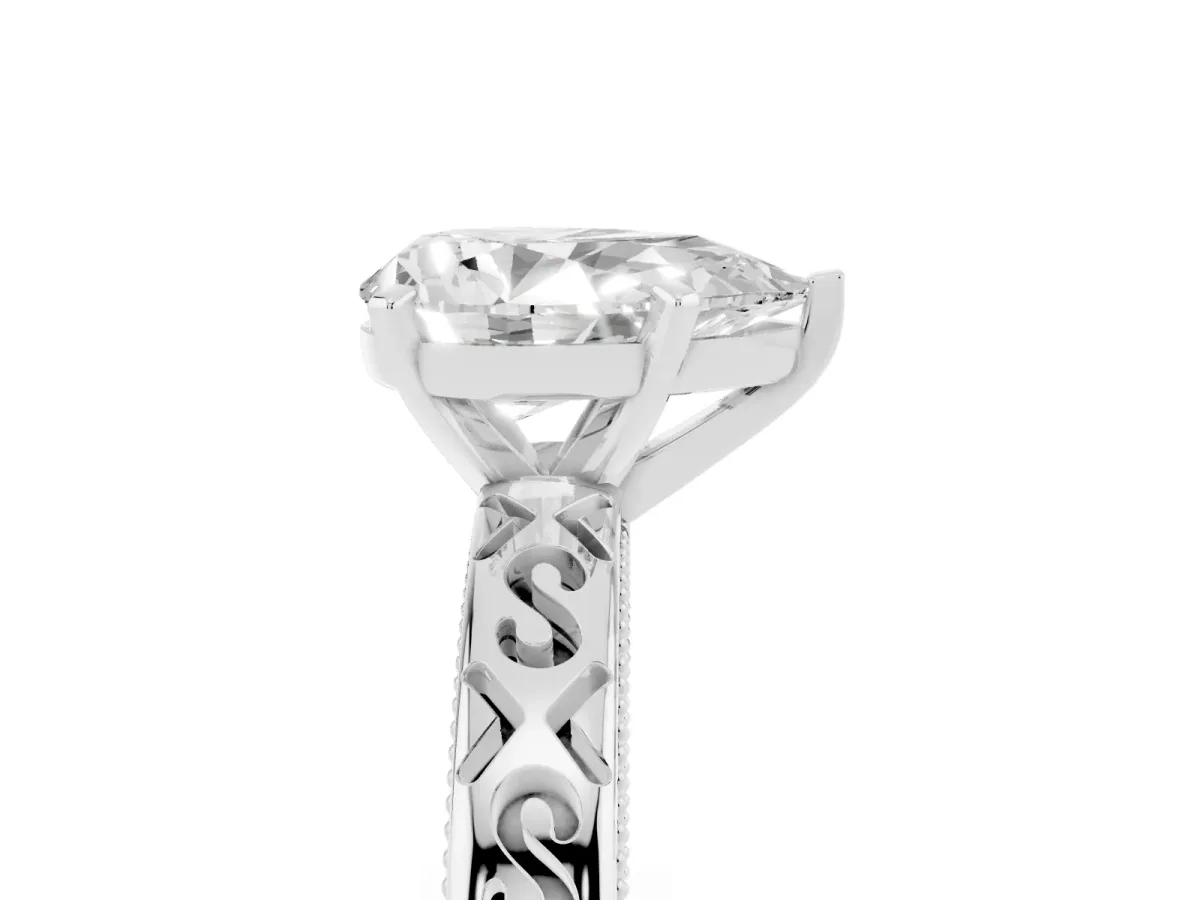 Pear Cut Solitaire Engagement Ring with Scrollwork Band and Four-Prong Setting White gold