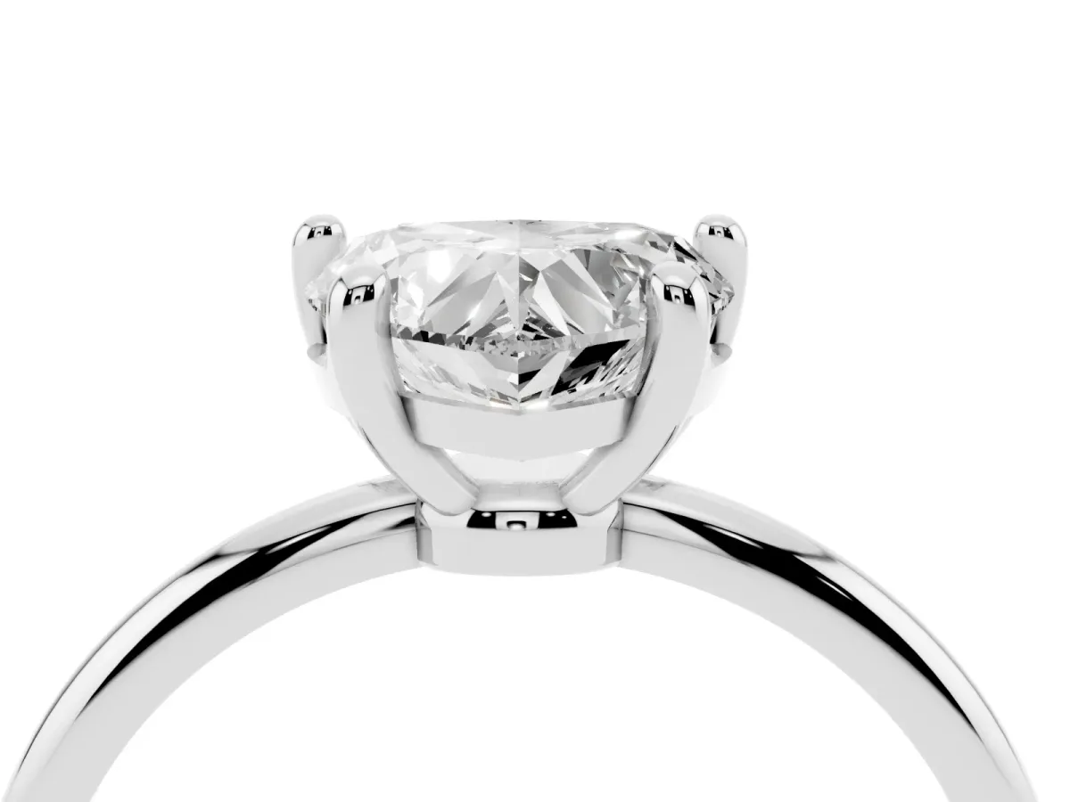Heart Cut Solitaire Diamond Ring with 4-Prong Setting on a Classic Band Silver