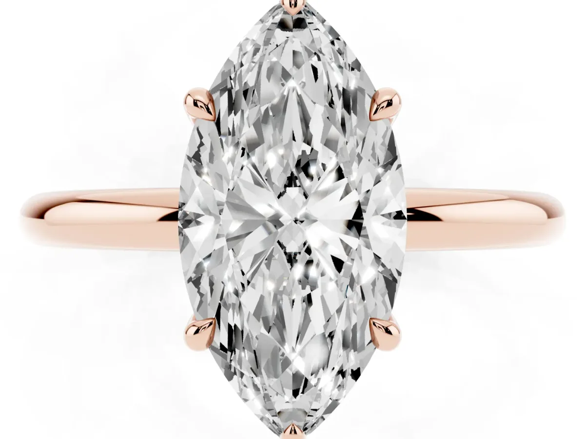 Marquise Cut Diamond Solitaire Ring with Thin Band and Four-Prong Setting Rose gold