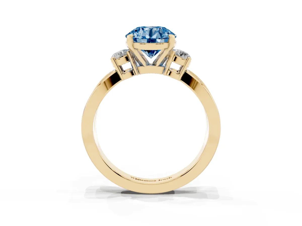 Fancy Blue Three-Stone Round Cut Cut Diamond Twist Band with Prong Setting Yellow gold