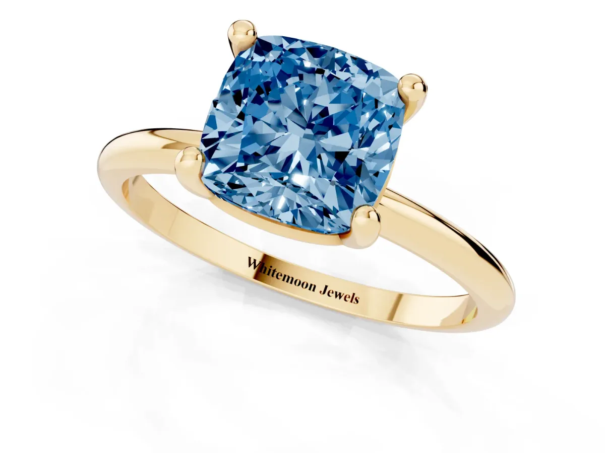 Fancy Blue Cushion Cut Solitaire Diamond Ring with 4-Prong Setting on a Classic Band Yellow gold