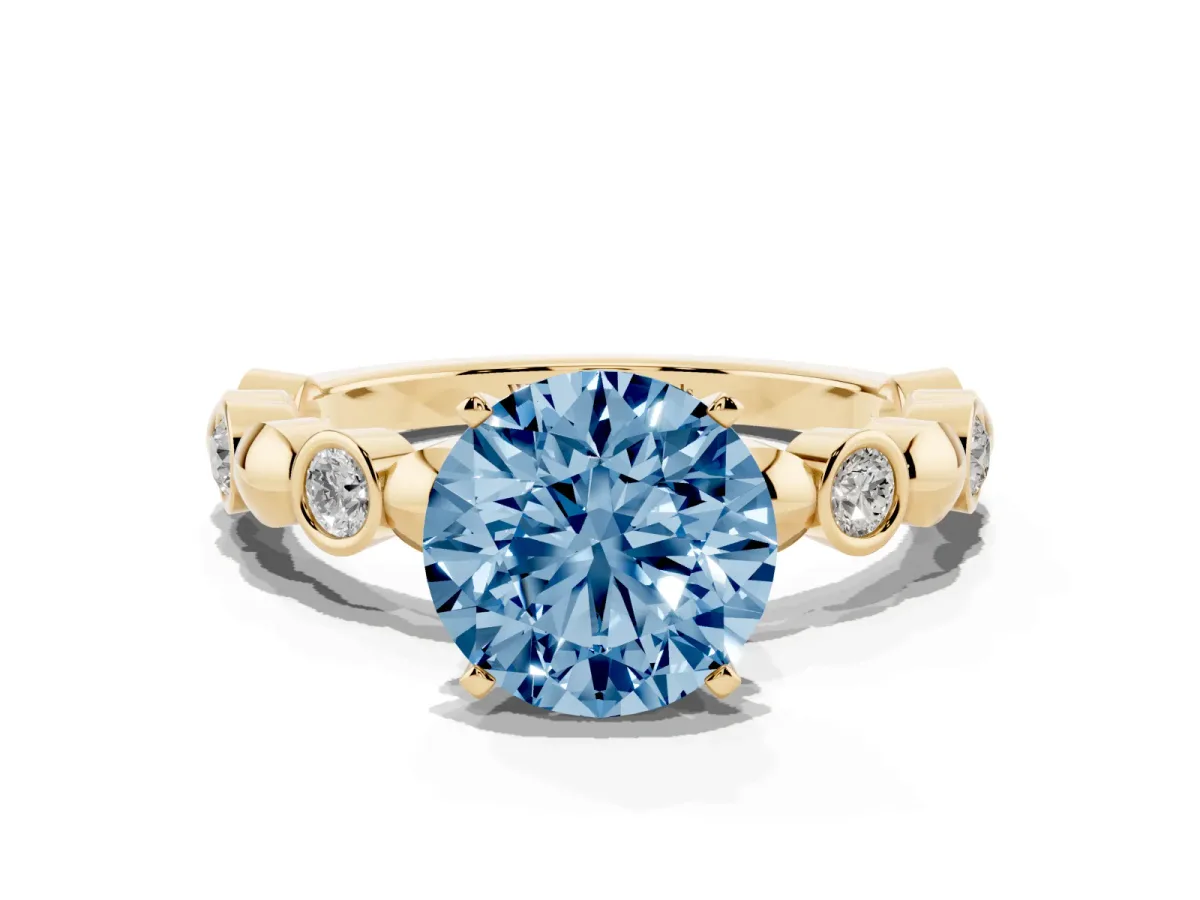 Fancy Blue Round Cut Solitaire Bezel-Set Diamond Ring with Beaded Band and Four-Prong Setting Yellow gold