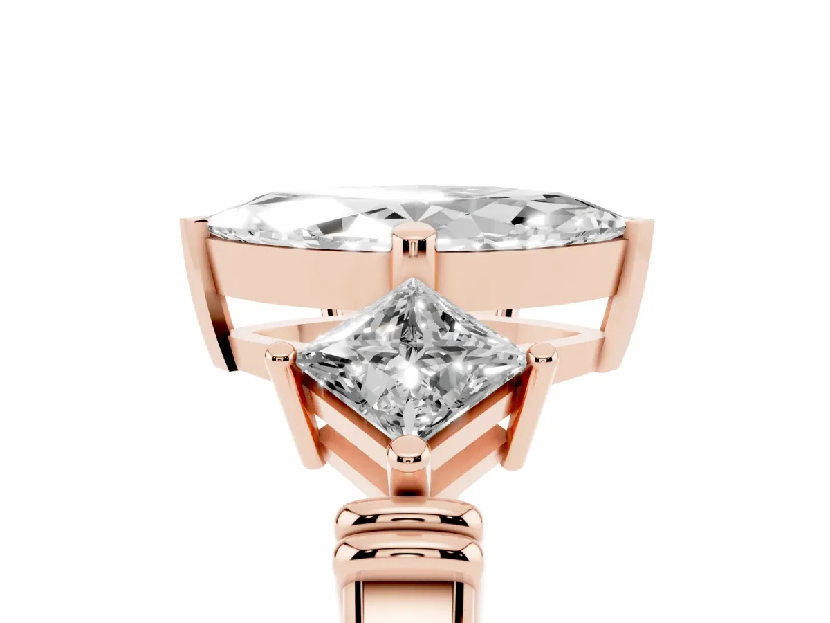 Three-Stone Marquise Cut and Princess Cut Diamond Ring with Channel Band and Four-Prong Setting Rose gold