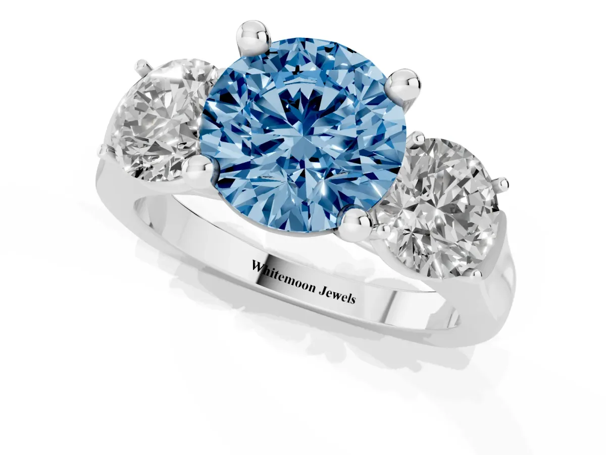 Fancy Blue Three-Stone Round Cut Brilliant Diamond Trellis Ring with Comfort Fit Band White gold