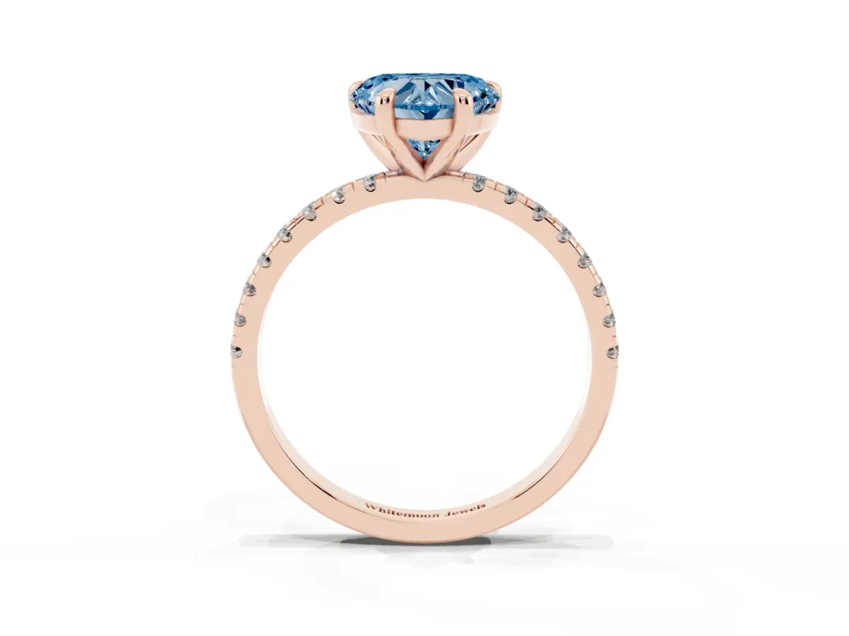 Fancy Blue Heart Cut Diamond Brilliant Solitaire Ring with Pavé Band and Four-Prong Setting Rose gold
