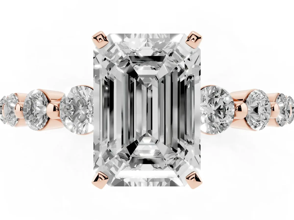 Emerald Cut Solitaire Diamond Ring with Pave Band and Four-Prong Setting Rose gold