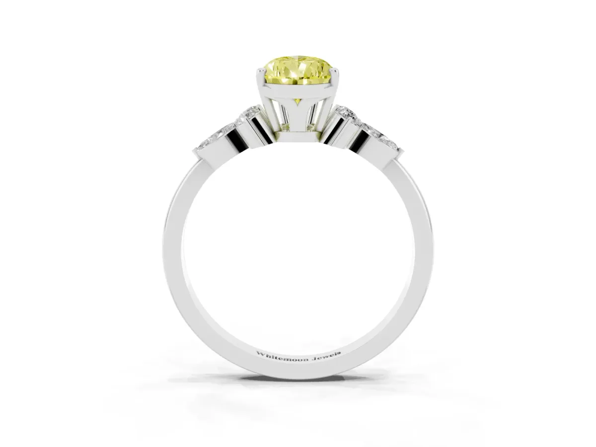 Fancy Yellow Pear Cut Brilliant Diamond Solitaire Ring with Pear Side Stones and Four-Prong Setting Silver