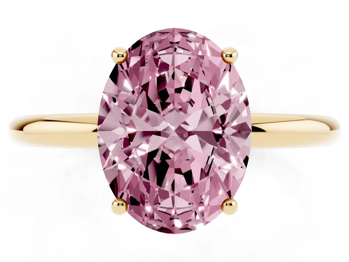 Fancy Pink Oval Cut Solitaire Diamond Ring with a Classic Band and Four-Prong Setting Yellow gold