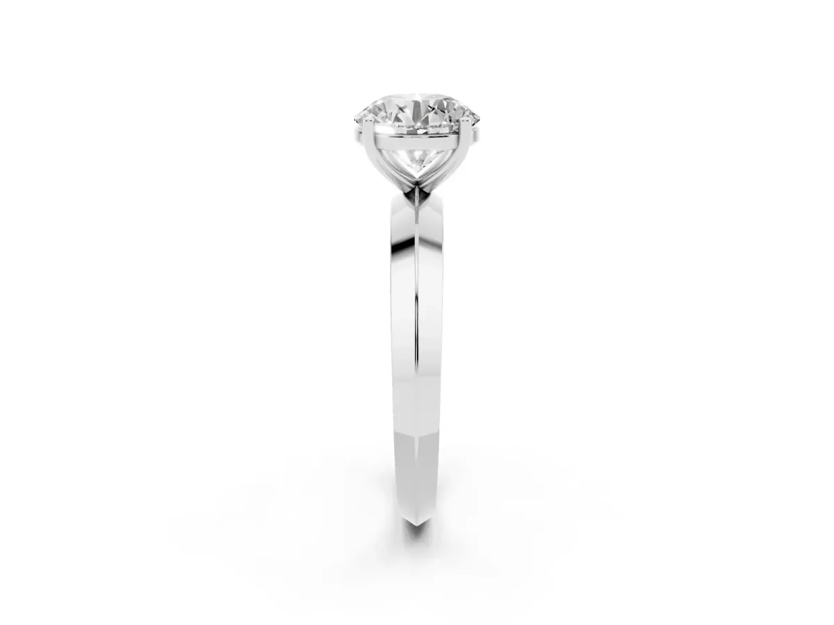 Round Cut Cut Solitaire Engagement Ring with Flat Band and Four-Prong Setting Silver