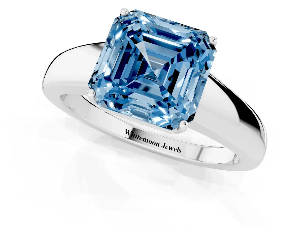 Fancy Blue Asscher Cut Solitaire Diamond Ring with Tapered Band and Four-Prong Setting Silver