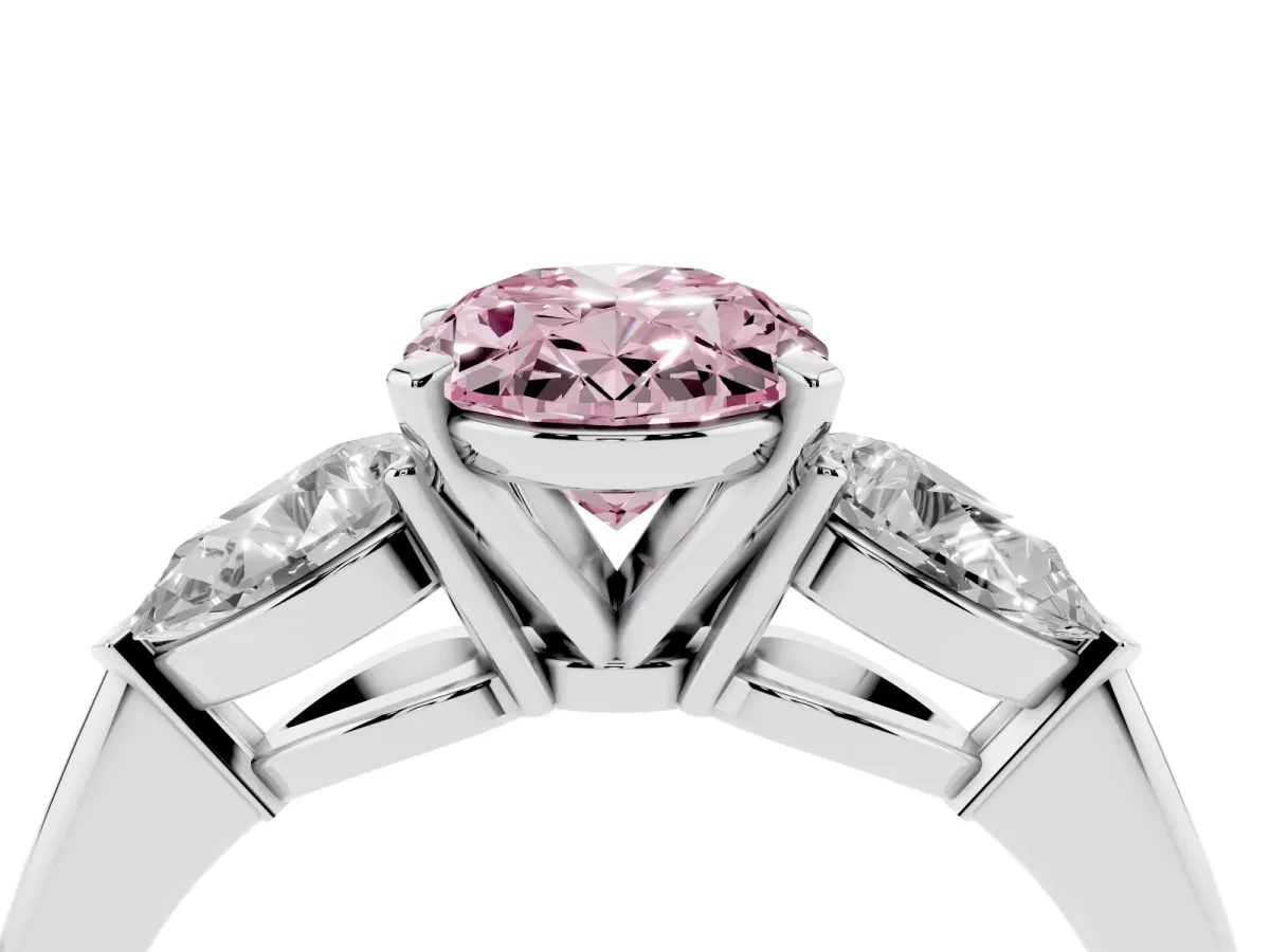 Fancy Pink Three-Stone Oval Cut Diamond Ring with Pear Side Stones and Four-Prong Setting Silver