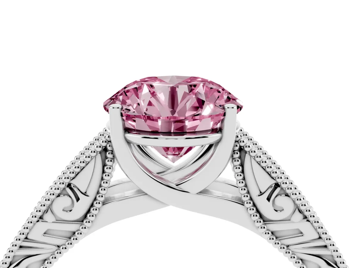 Fancy Pink Round Cut Diamond Solitaire Ring with Engraved Band and Four-Prong Setting White gold