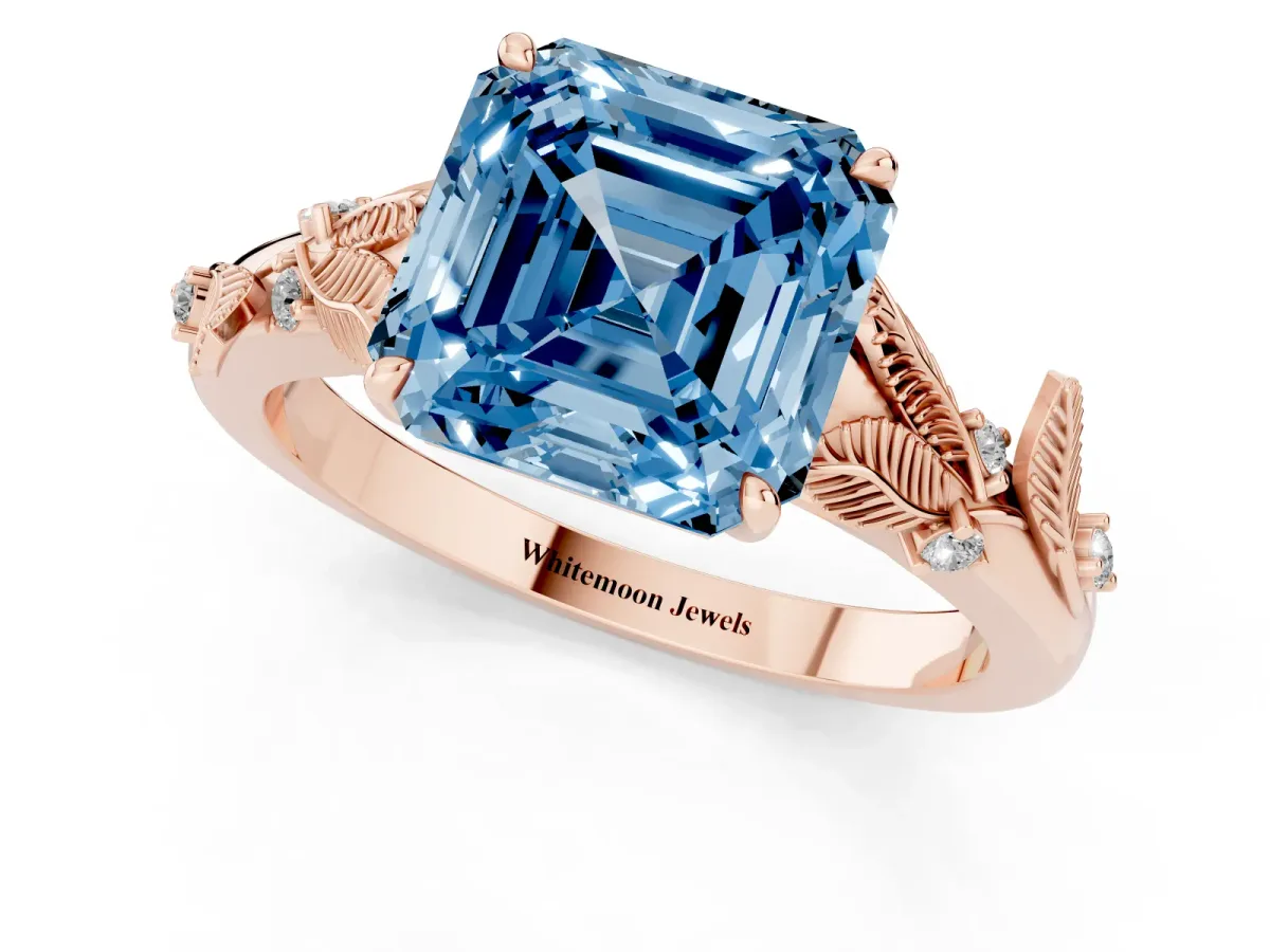 Fancy Blue Asscher Cut Diamond Solitaire Ring with Leaf Motif Band and Four-Prong Setting Rose gold