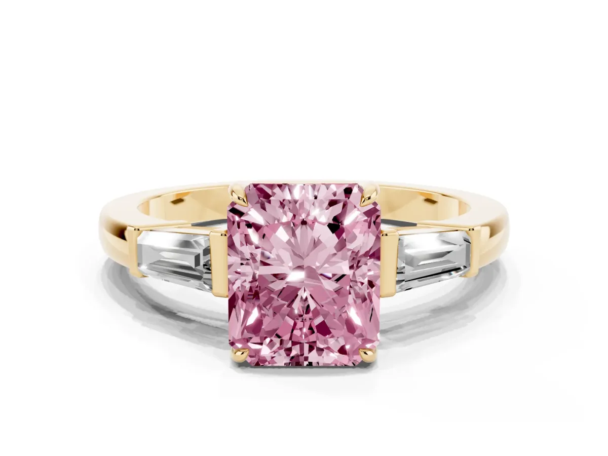 Fancy Pink Radiant Cut Diamond Three-Stone Ring with Tapered Baguette Side Stones and Prong Setting Yellow gold