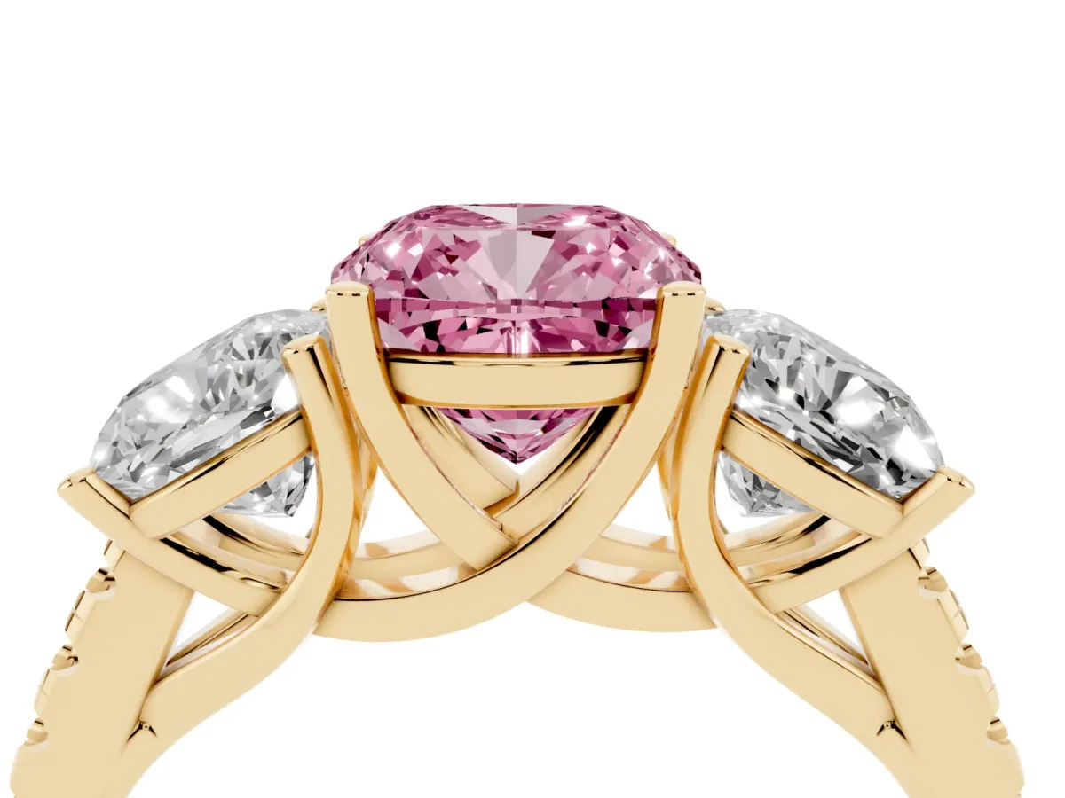 Fancy Pink Three-Stone Cushion Cut Diamond Ring with Round Pavé Band and Prong Setting Yellow gold