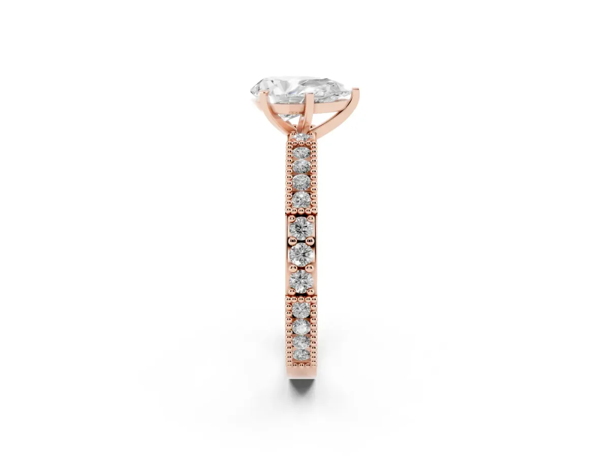 Pear Cut Solitaire with Pavé Band and Four-Prong Setting Rose gold