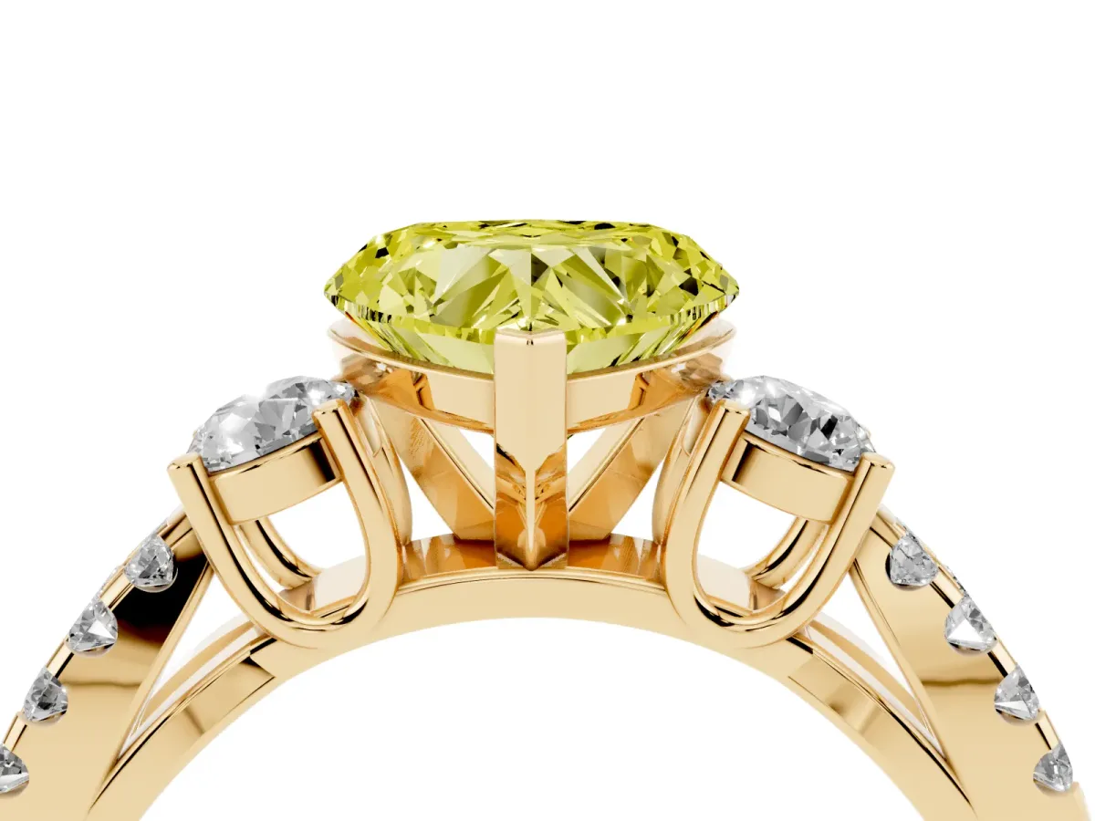 Fancy Yellow Heart Cut Diamond Three-Stone Ring with Pavé Split Shank and Four-Prong Setting Yellow gold