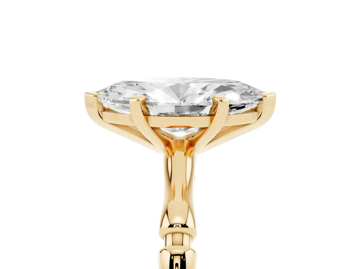 Marquise Cut Solitaire Diamond Ring with Bamboo Band and Four-Prong Setting Yellow gold