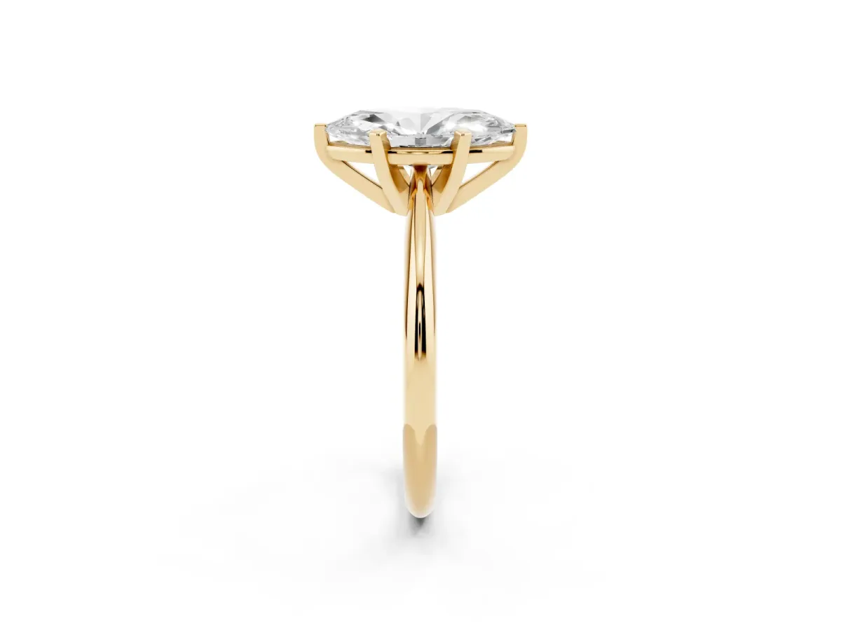 Marquise Cut Cut Solitaire Ring with Four-Prong Setting on a Classic Band Yellow gold