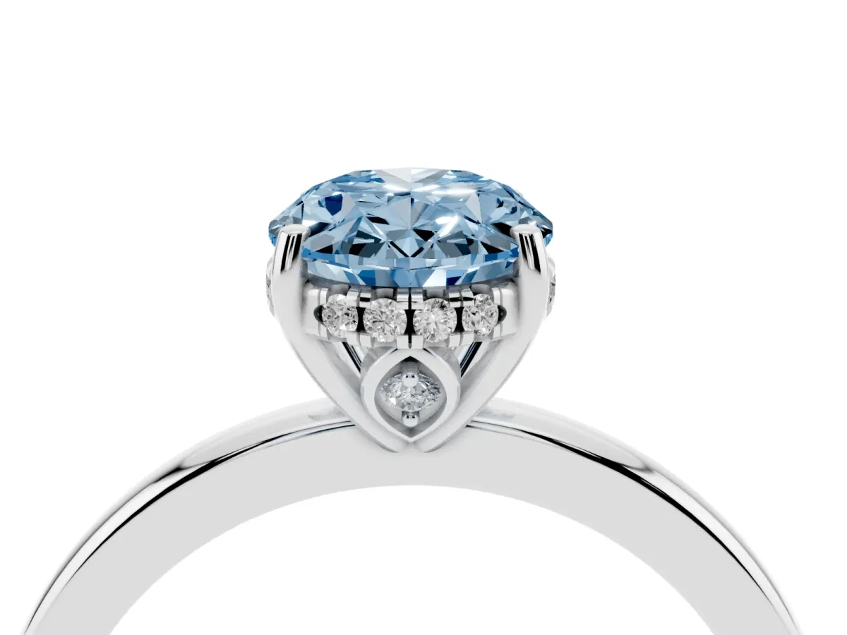 Fancy Blue Oval Cut Solitaire Diamond Ring with Prong Setting and Plain Band Platinum