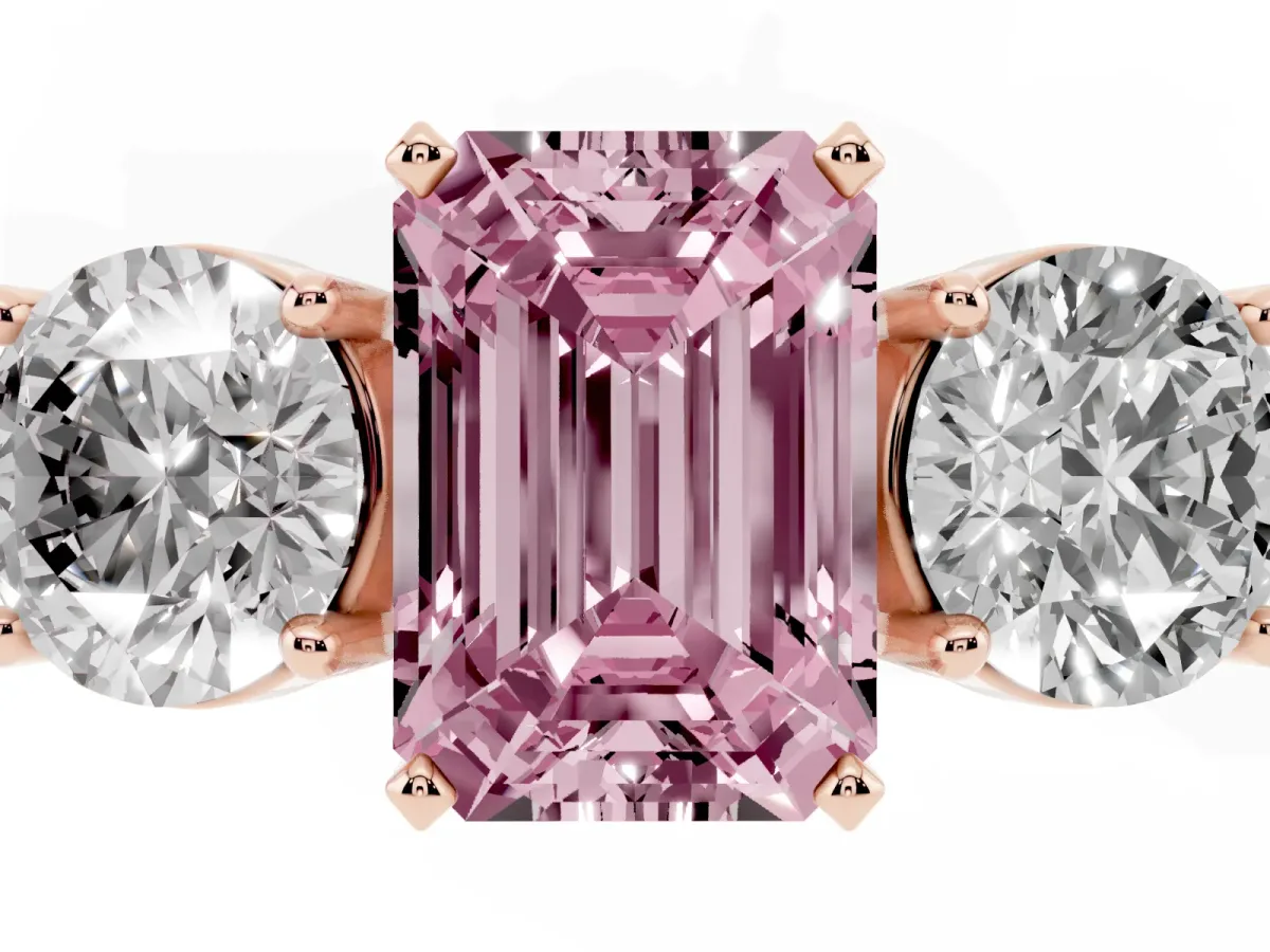 Fancy Pink Three-Stone Emerald Cut Diamond Ring with Round Side Stones, Classic Band, and Four-Prong Setting Rose gold