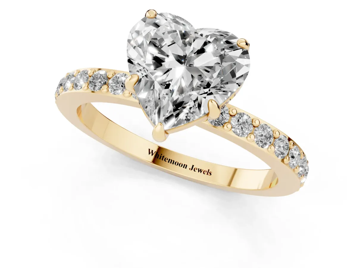 Heart Cut Diamond Pavé Engagement Ring with Round Accents and Prong Setting Yellow gold