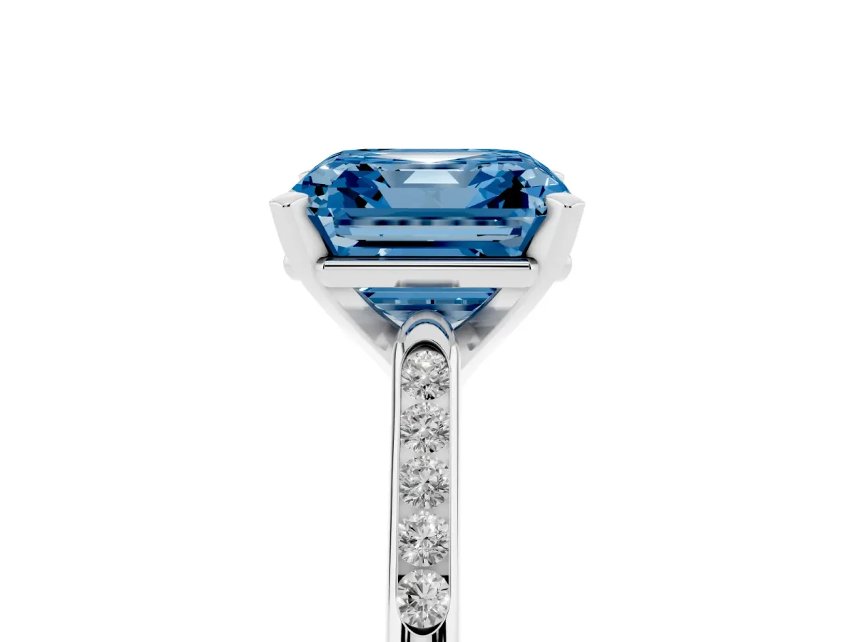 Fancy Blue Asscher Cut Diamond Solitaire Ring with Channel Set Round Band and Prong Setting Silver