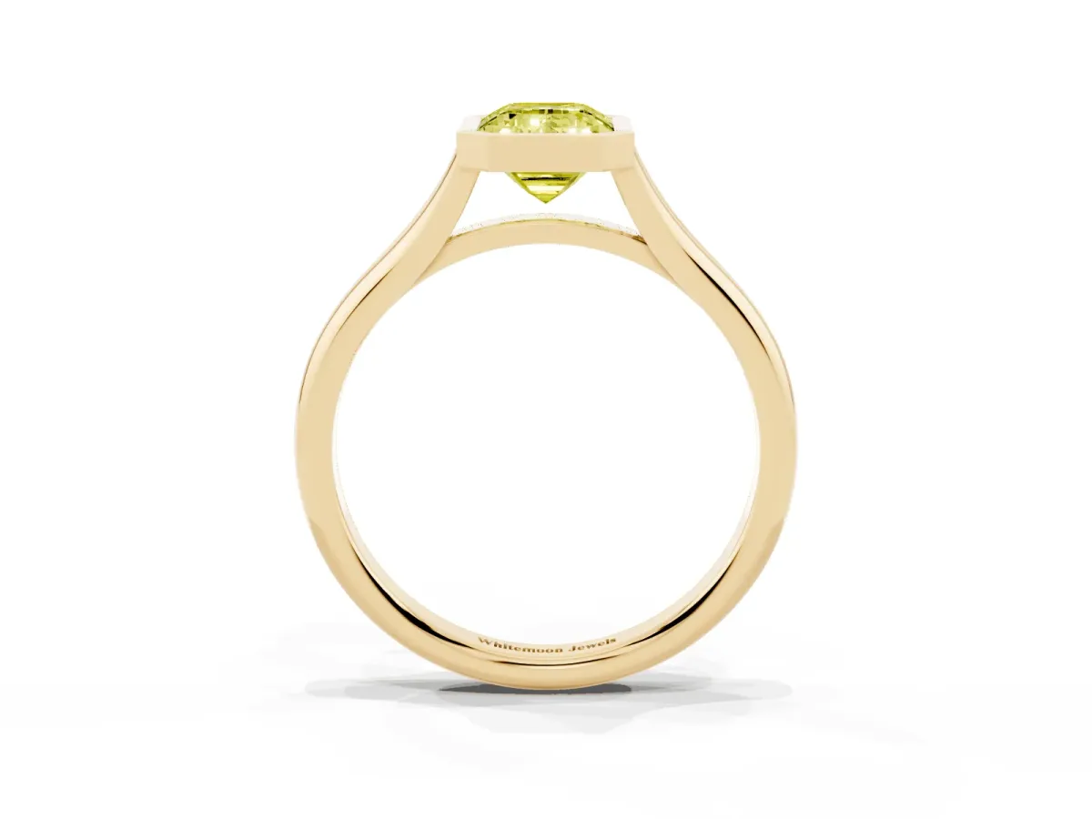 Fancy Yellow Bezel Set Emerald Cut Cut Solitaire Ring with Tapered Band Yellow gold