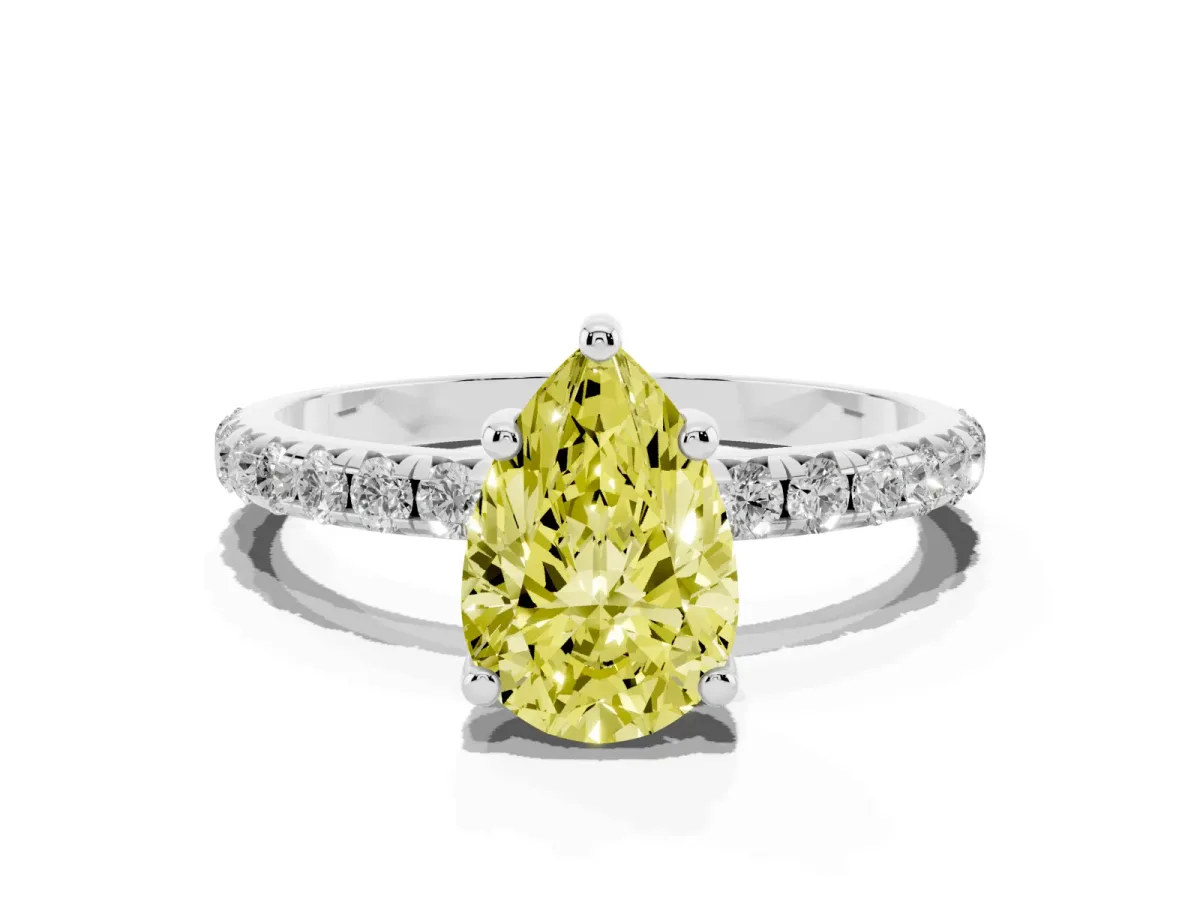 Fancy Yellow Pear Cut Cut Diamond Solitaire Ring with Micro Pave Band and Four Prong Setting Silver