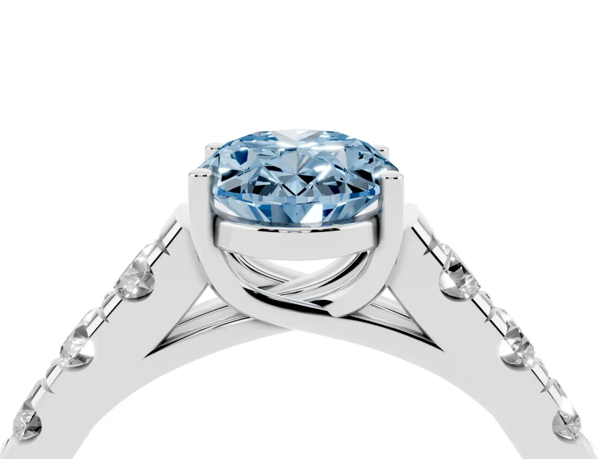 Fancy Blue Oval Cut Cut Diamond Solitaire Ring with Micro Pave Band and Prong Setting Silver