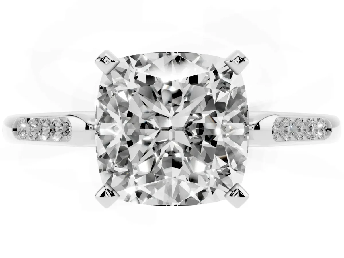 Cushion Cut Diamond Solitaire Ring with Channel Set Round Band and Prong Setting Silver