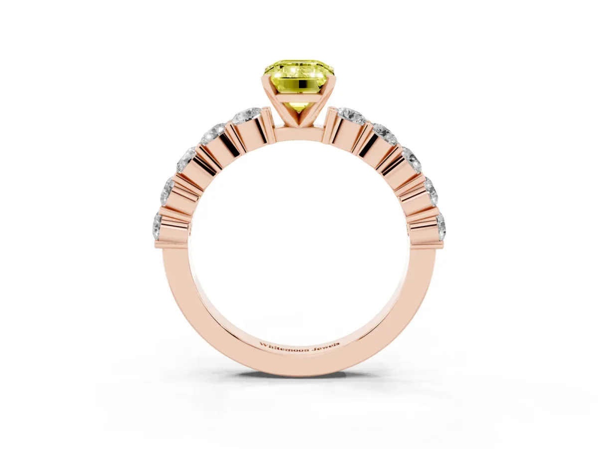 Fancy Yellow Emerald Cut Diamond Solitaire Ring with Shared Prong Round Side Stones Rose gold